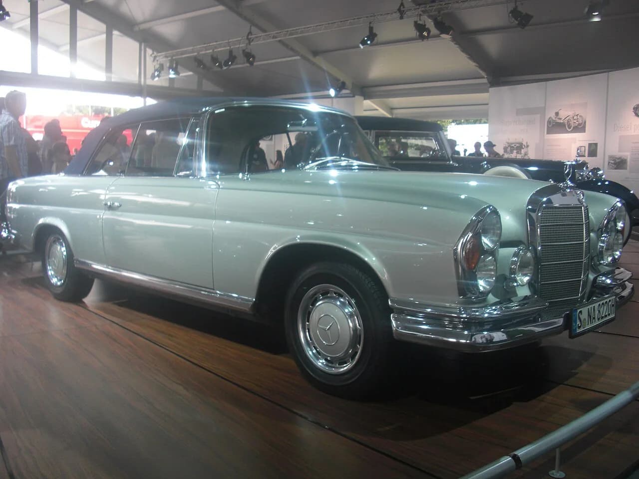 Ivory Mercedes-Benz cabriolet photographed from the front three-quarter