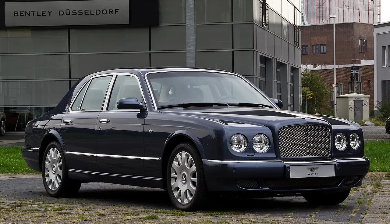 Dark blue Bentley Arnage R photographed from the front three-quarter